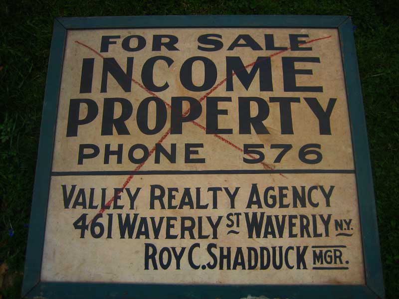 For sale sign from 1958, found in the basement