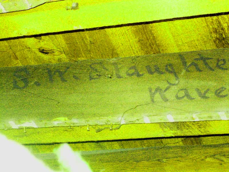 Ceiling under the former garage apartment with S. W. Slaughter Waverly, NY written on